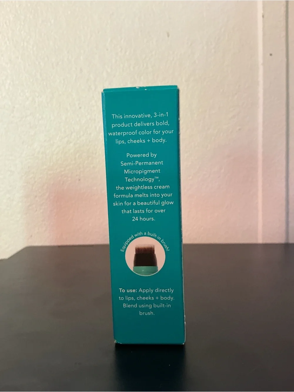 thrive causemetics Triple Threat Color Stick in Teal Packaging with gold shimmer